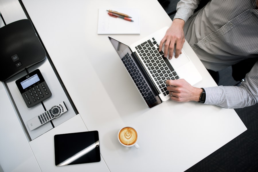 A creative team reviewing multiple brand assets on a desk.